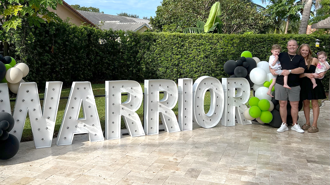 Jordan and family celebrating the end of his treatment