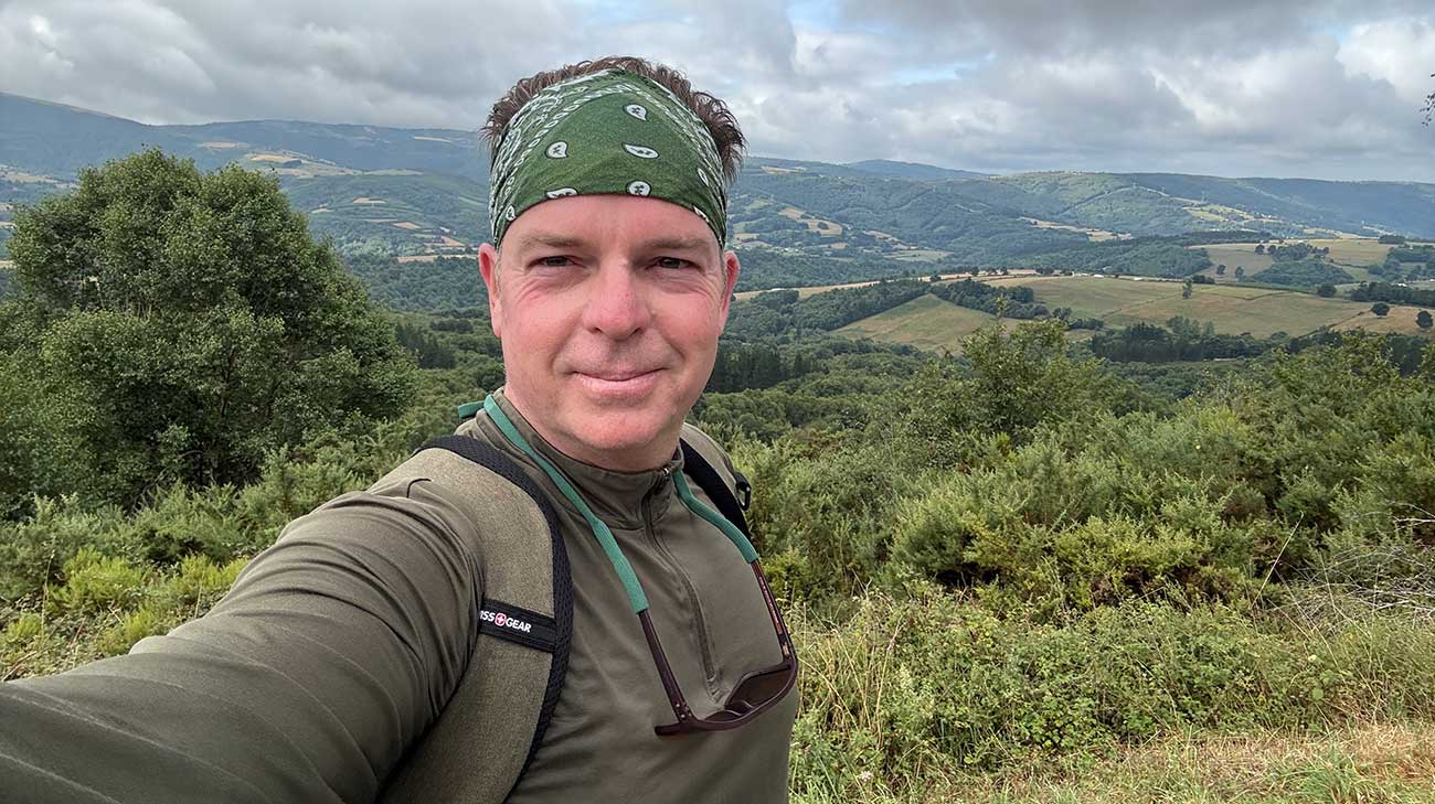 Rich overlooking the rolling hills of Spain