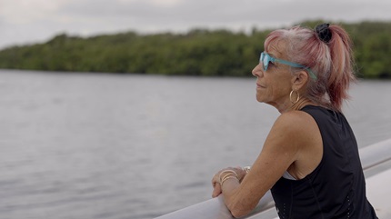 Mindy looking at a lake
