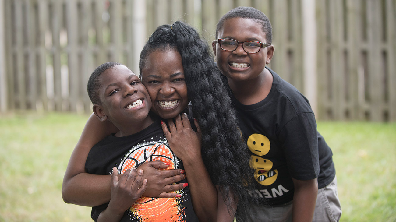 Justin (left) enjoys spending time with his mom, Nicole, and his brother, Tanner.