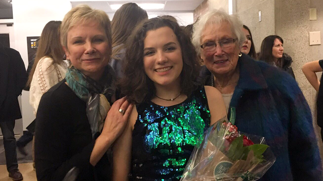 Deb Miller (left) and her mother Christa Schoenknecht (right) congratulate her niece Joelle Kristoff (center) following her school play (4 years post-surgery).