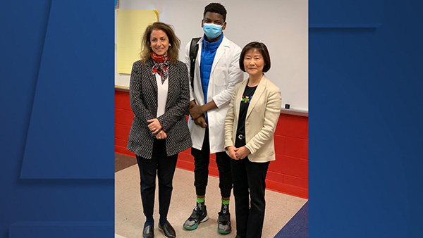 Cleveland Clinic and IBM surprised Cleveland high school student, Mussa Wisoba, with a quantum computing internship. (Pictured: Dr. Lara Jehi, Mussa Wisoba and Dr. Ruoyi Zhou)