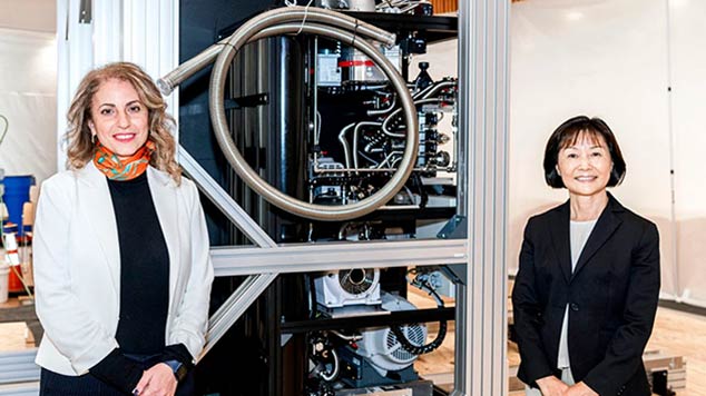Lara Jehi, M.D., and Ruoyi Zhou, Ph.D., at the site of the IBM Quantum System One on Cleveland Clinic’s main campus.
