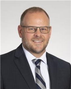 John D. Idoine, III, DO