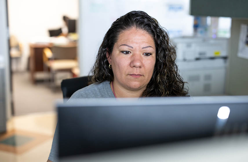 Cleveland Clinic employee working on a computer