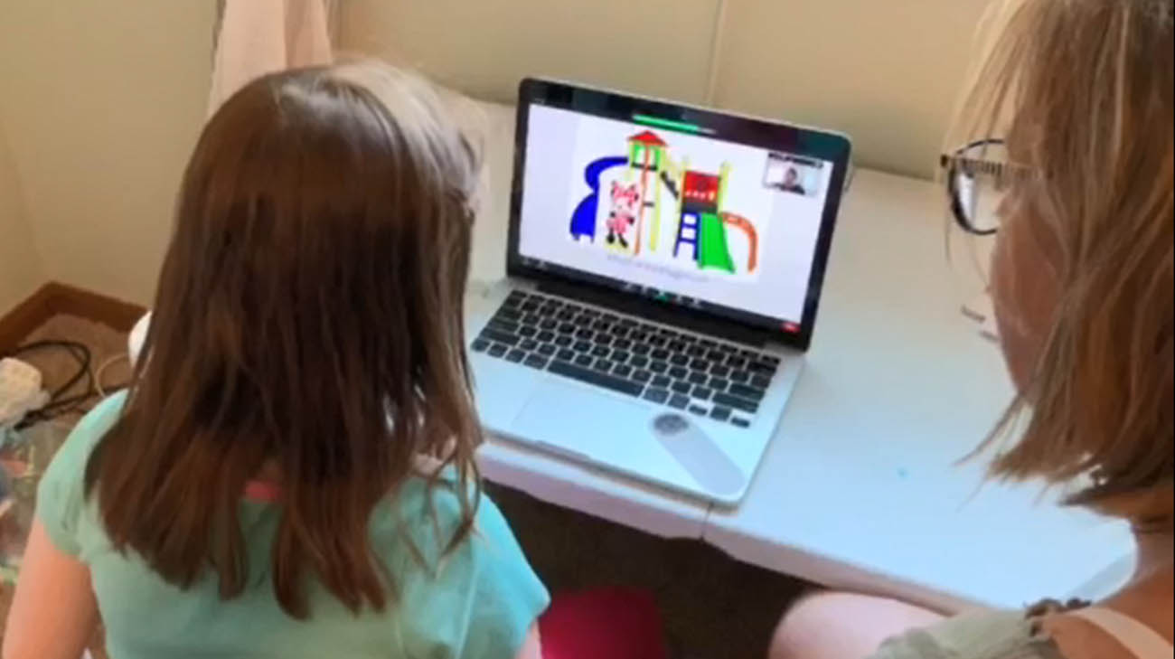 Maya virtually attending one of her Lerner School for Autism classes.