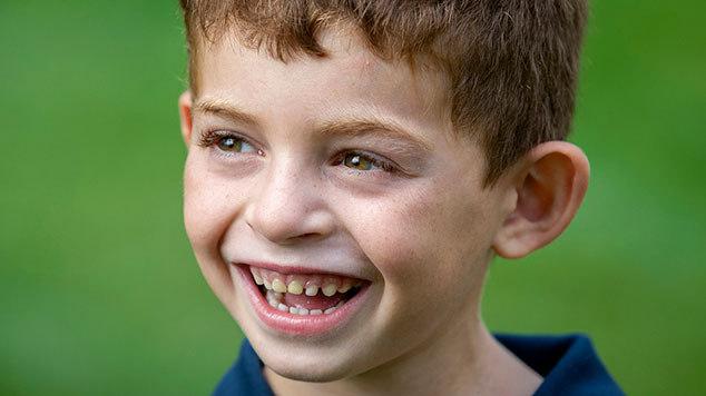 Seizure-free after epilepsy-curing brain surgery, Eviatar has a big smile on his face.